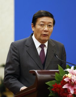 Chinese Finance Minister Lou Jiwei gives a speech through the signing ceremony associated with the Asian Infrastructure Investment Bank on Great Hall of the People in ...