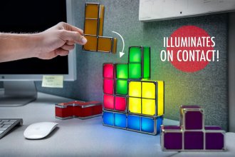 guy adding a tetrimino to their Tetris Lamp in an office.