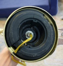Nut on bottom of lamp
